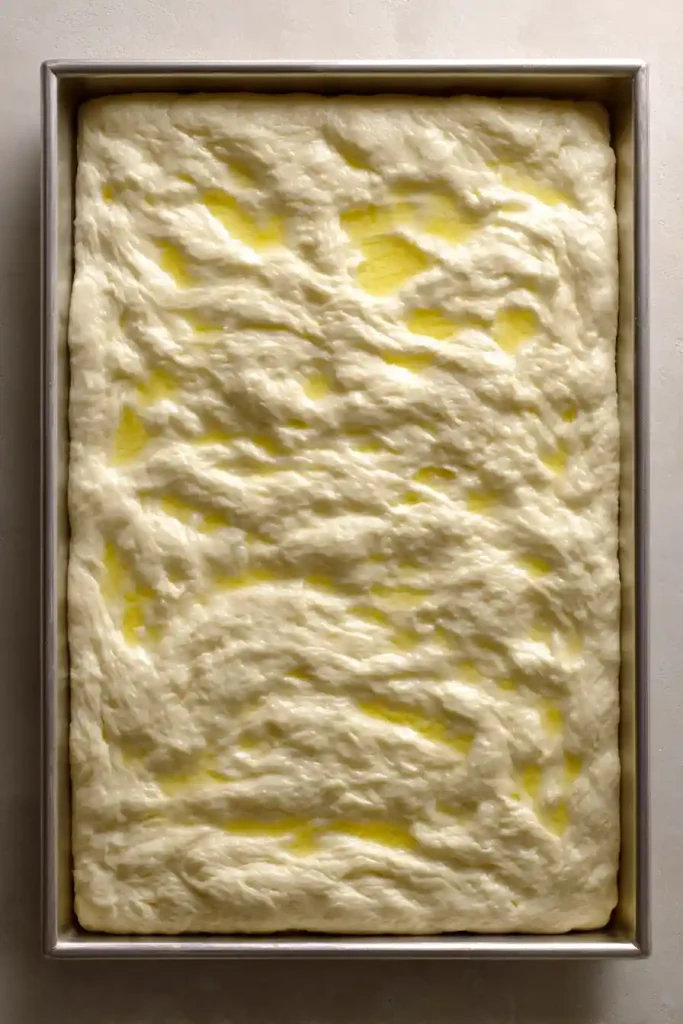 Easy Same-Day Focaccia Bread: Bake It in Minutes! 131 This fluffy homemade focaccia bread is crispy on the outside and soft inside. Perfect for beginners and ready the same day with simple ingredients like flour yeast olive oil and rosemary