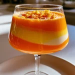 Candy Corn Layered Cocktail: Unleash Halloween Magic! 85 Candy Corn Layered Cocktail: A Sweet Halloween Sip!